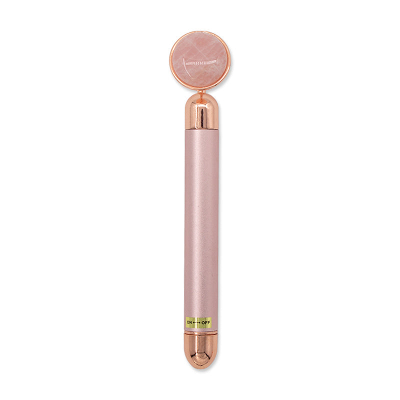 Electric Rose Quartz Face Massager Roller Aoxily CHN, Inc. All Rights Reserved.